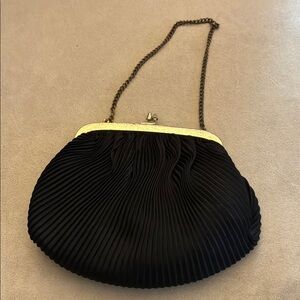 Elegant Black and Gold Semi-Circular Clutch with Chain